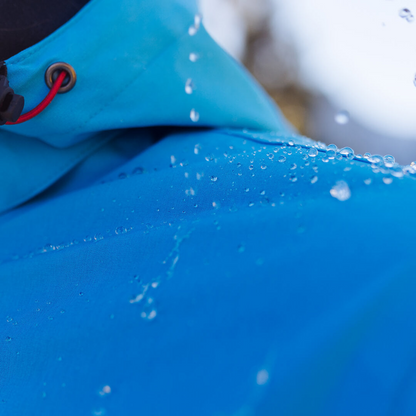 Men's Apricoat Adventurer 2.0 Weatherproof Rain Jacket in sky blue, featuring 16 integrated pockets, built-in gloves, and made from recycled materials.