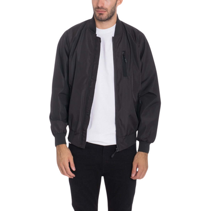 Men's black waterproof windbreaker jacket with full front zipper, ribbed cuffs, and multiple utility pockets.