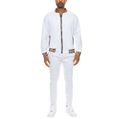 Men's two-piece Version Couture track suit with zip-up jacket and matching pants, featuring checkered detail on the collar, cuffs, and waistband.