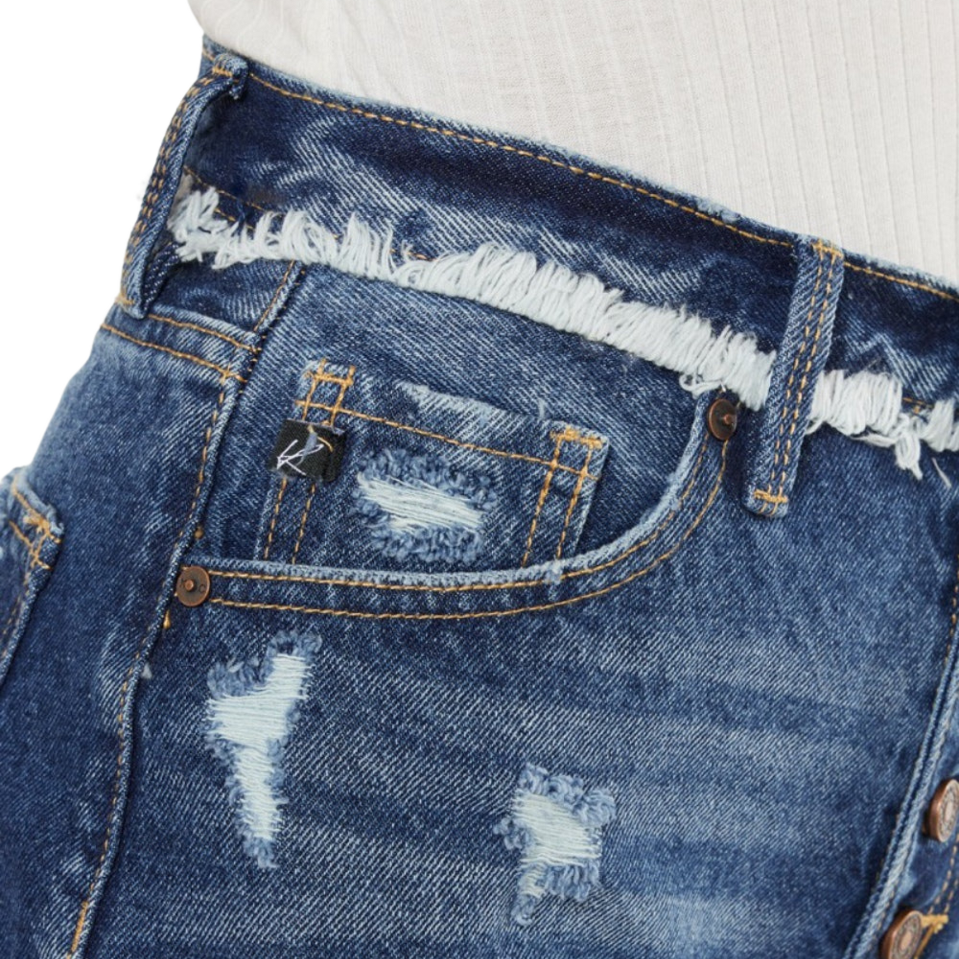 Women's Distressed Button Fly Denim Shorts by Risen with raw hem, button-fly, and washed denim in a casual, trendy style, available in standard and plus sizes.