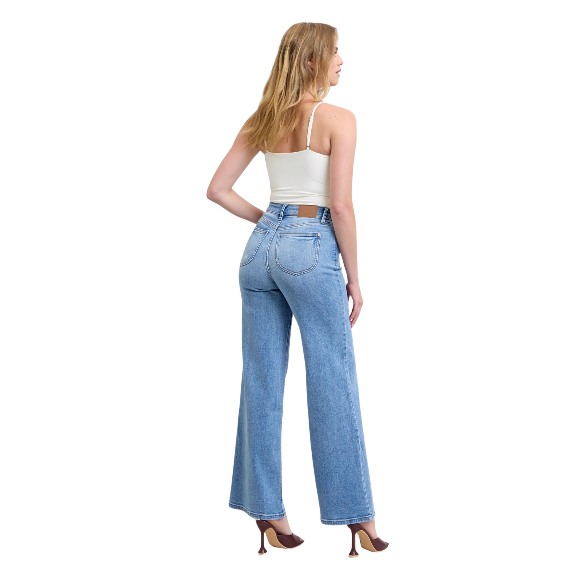 Women’s High Rise Flare Bottom Judy Blue Denim Jeans with wide-leg silhouette, high-rise waist, and front and back pockets in light-washed denim.